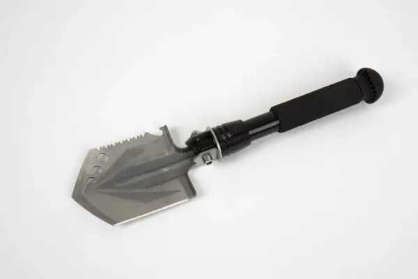 Multifunctional shovel with saw and cutting blade, bottle opener
